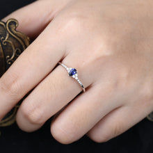 Pear Cut Sapphire Ring with Moissanite Accents