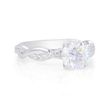 Round Cut Moissanite Ring with Pavé Twist Shank