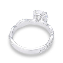 Round Cut Moissanite Ring with Pavé Twist Shank