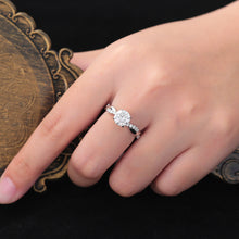 Round Cut Moissanite Ring with Pavé Twist Shank